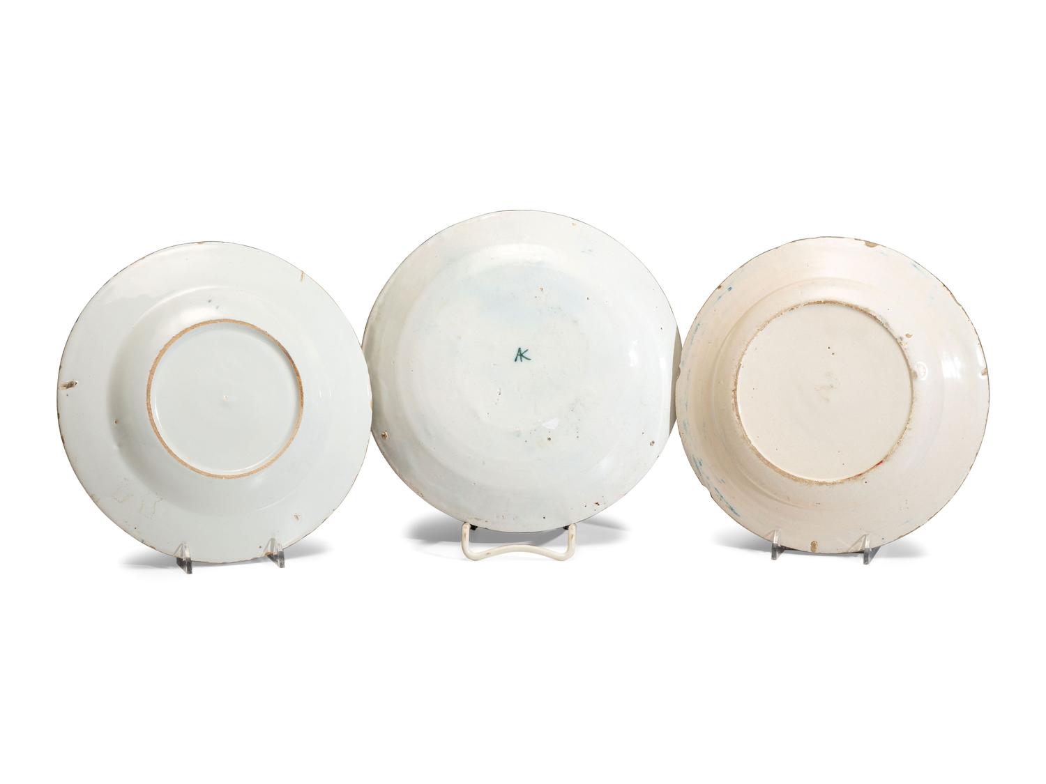 Three Polychrome Delftware Plates