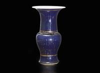 A Chinese gilt-decorated blue-ground phoenix-tail vase, Qing dynasty 鎏金鳳尾尊 清