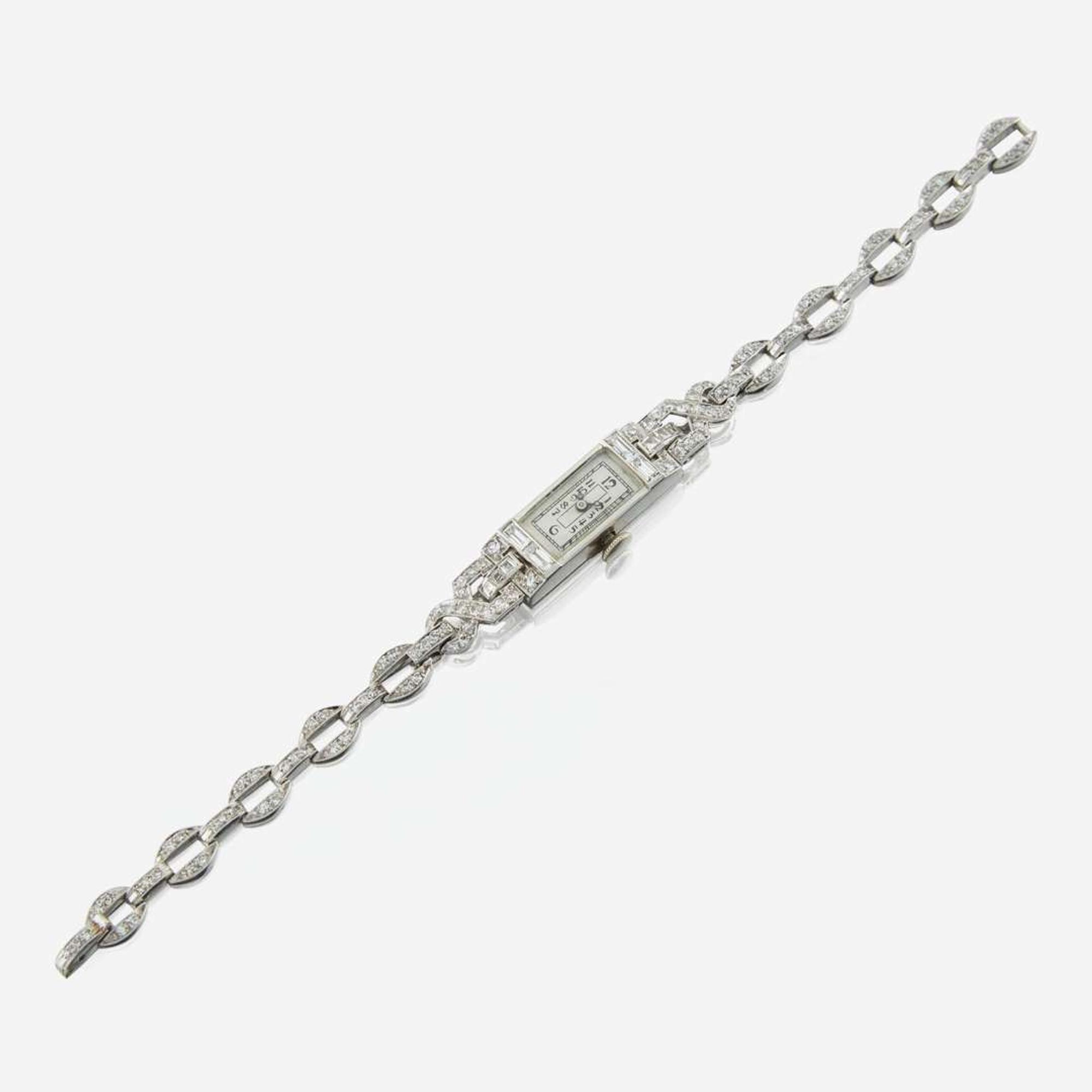 An Art Deco ladies platinum and diamond bracelet dress watch