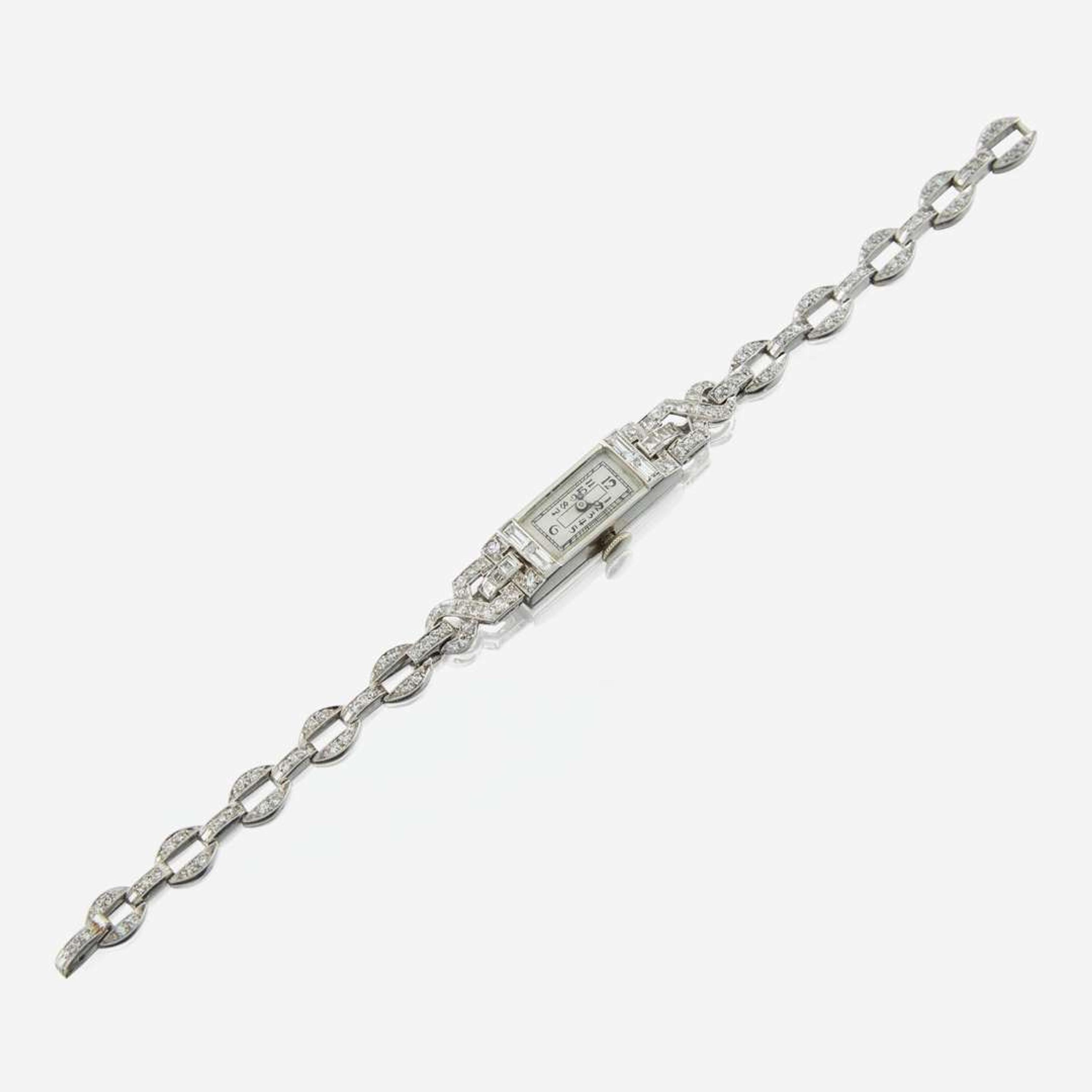 An Art Deco ladies platinum and diamond bracelet dress watch