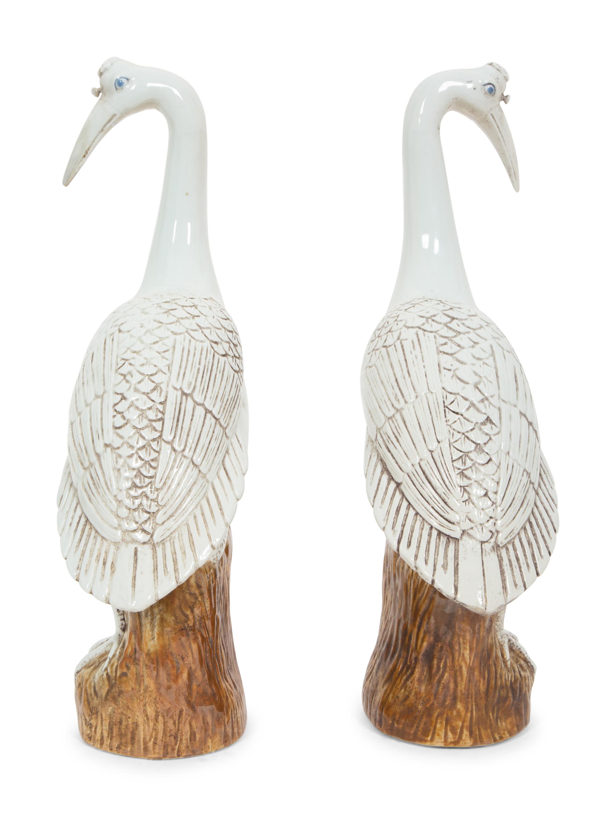 A Pair of Chinese Glazed Ceramic Cranes