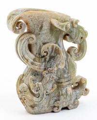 A Jade Rhyton Cup. Height 5 1/2 inches.