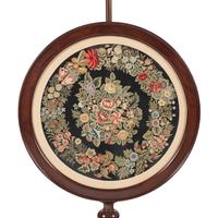 A William IV Carved Mahogany and Needlepoint Inset Circular Pole Screen