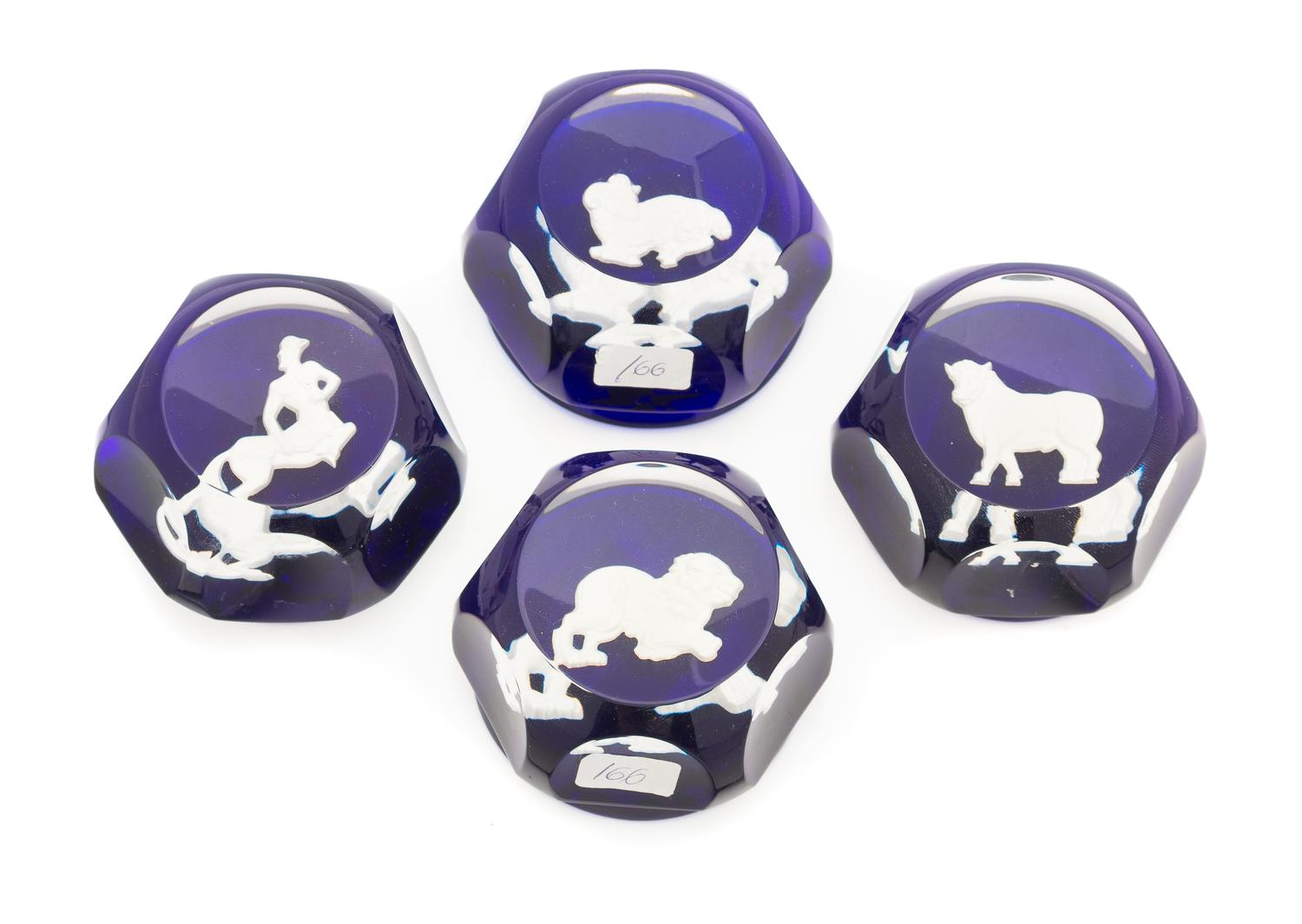 Baccarat , , four paperweights with zodiac symbols