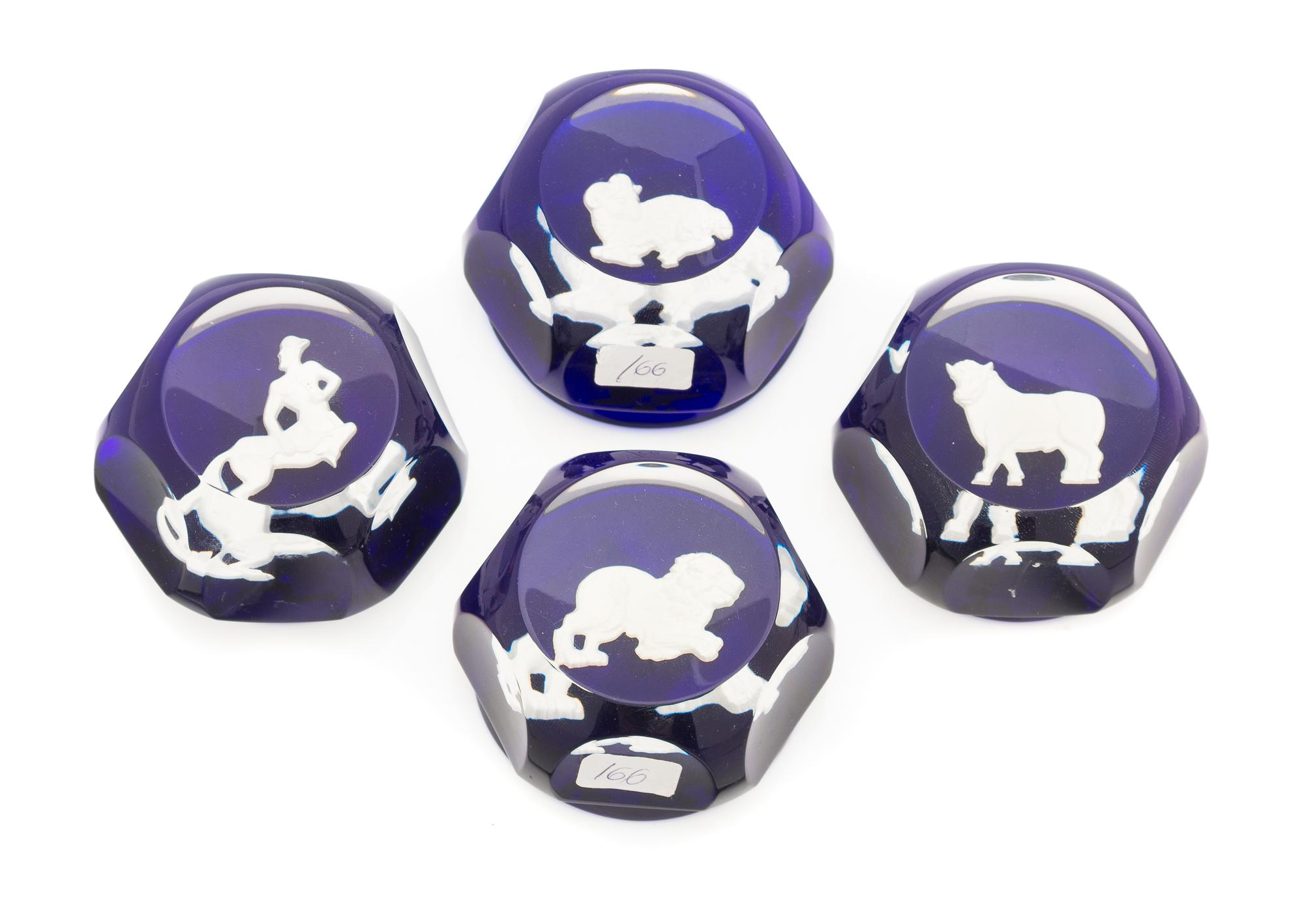 Baccarat , , four paperweights with zodiac symbols