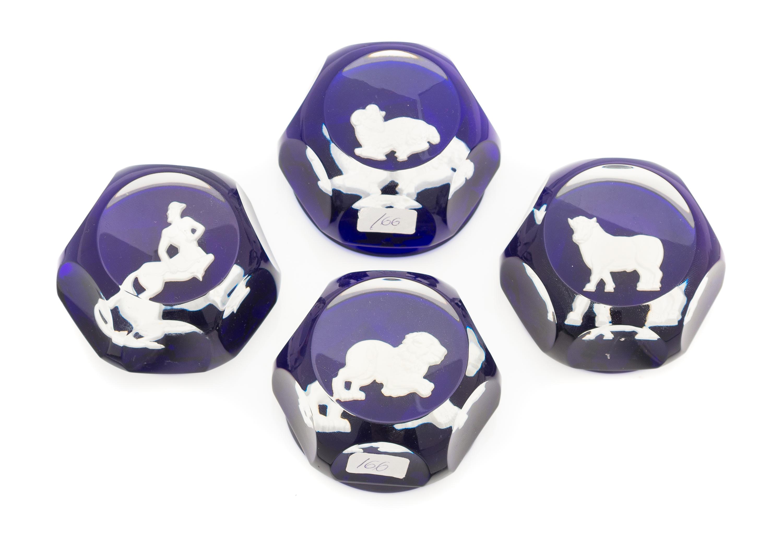 Baccarat , , four paperweights with zodiac symbols