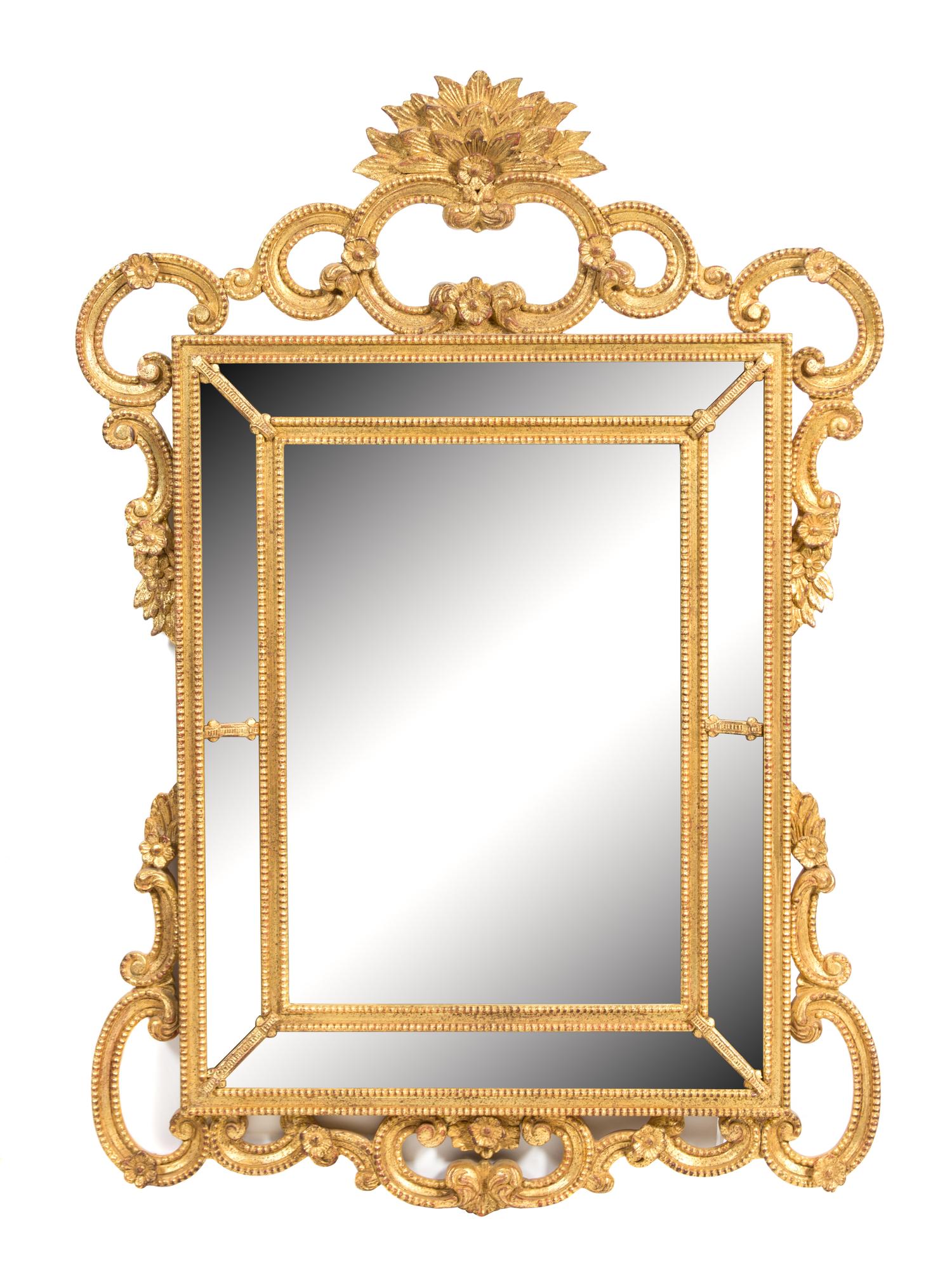 A Louis XV Giltwood Mirror Height 55 x width 38 1/2 inches. — 20TH CENTURY