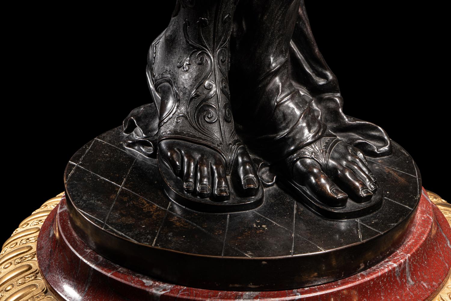 A Pair of Monumental Gilt and Patinated Bronze and Rouge Marble Figural Torchères