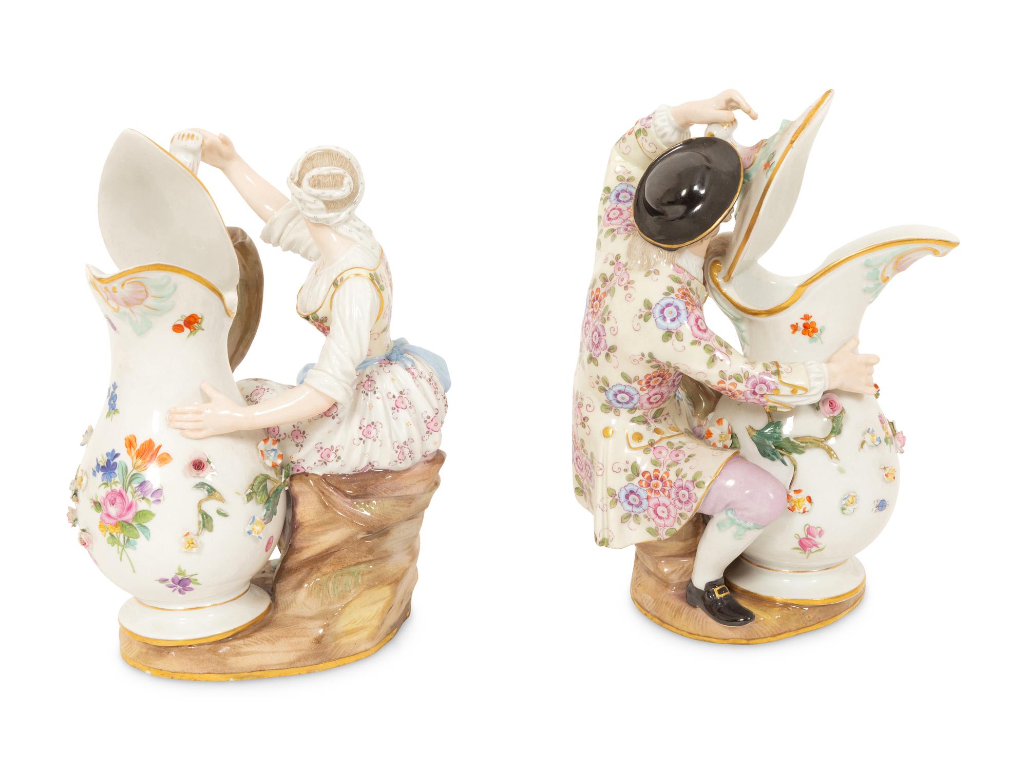 A Pair of Meissen Porcelain Figural Ewers