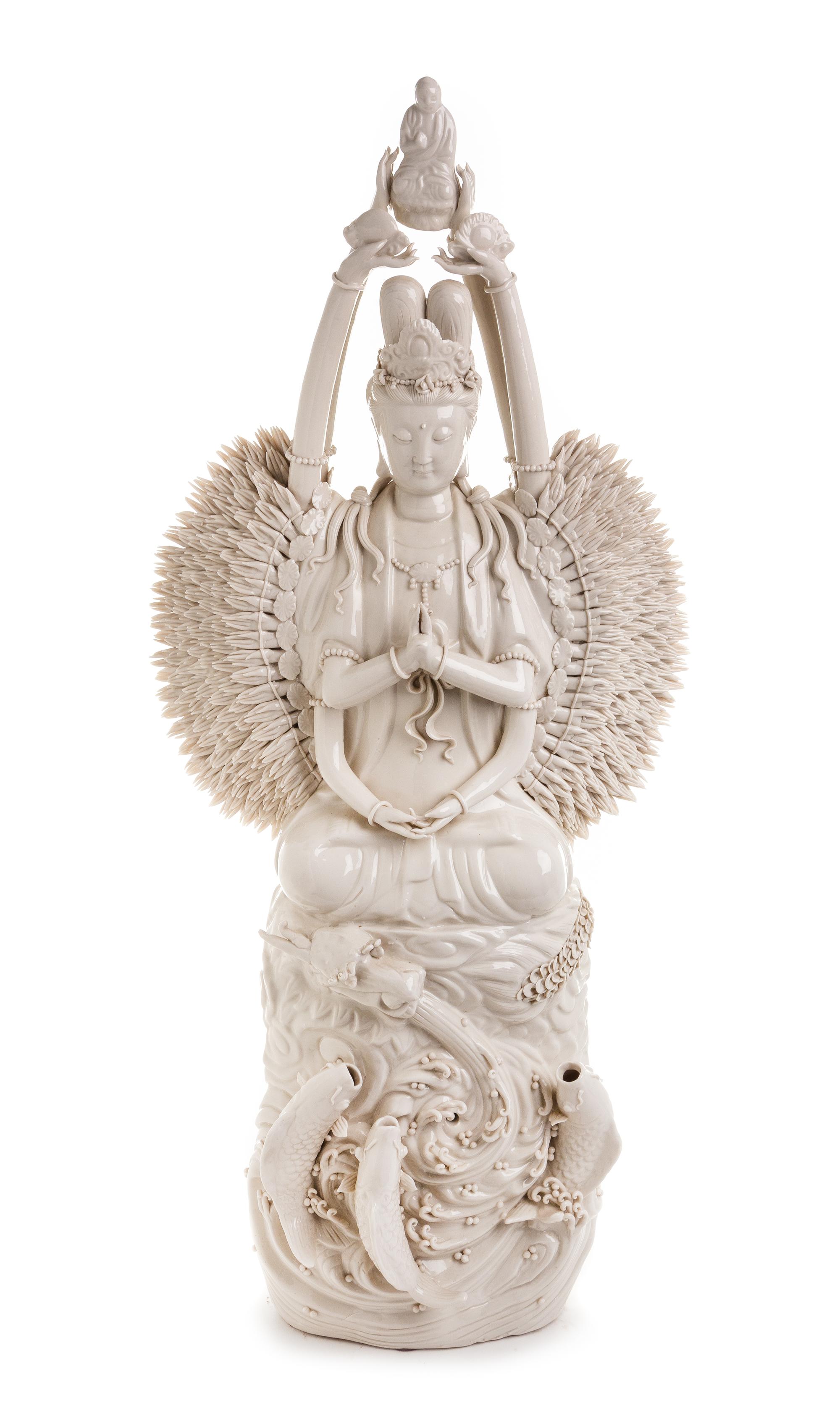 A Chinese Blanc-de-Chine Porcelain Figure of A Thousand-Hand Guanyin Height 30 1/2 inches.