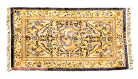 A Chinese Rug 7 feet 11 1/2 inches x 4 feet 9 inches.