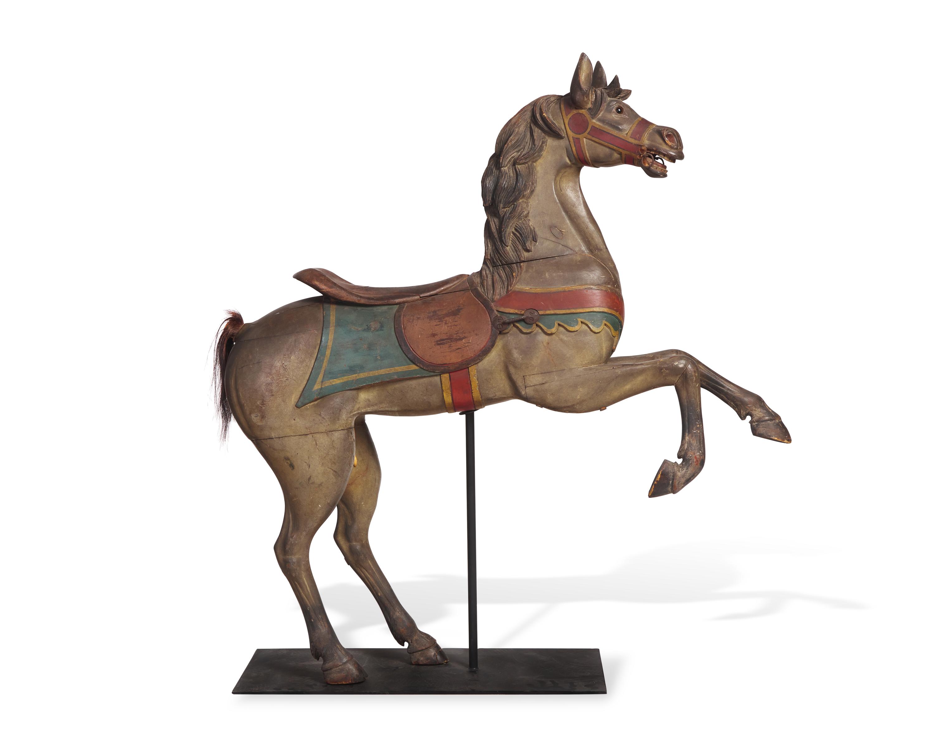 A Carved and Painted Wood Carousel Prancer