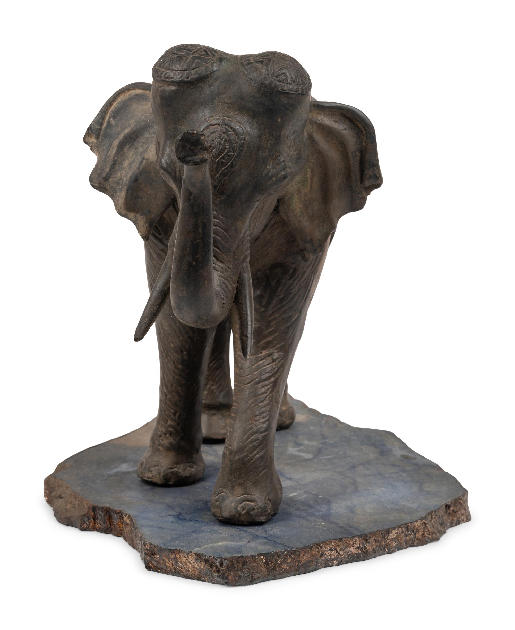A Cast Metal Elephant Sculpture