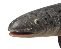 A Carved And Painted Trout