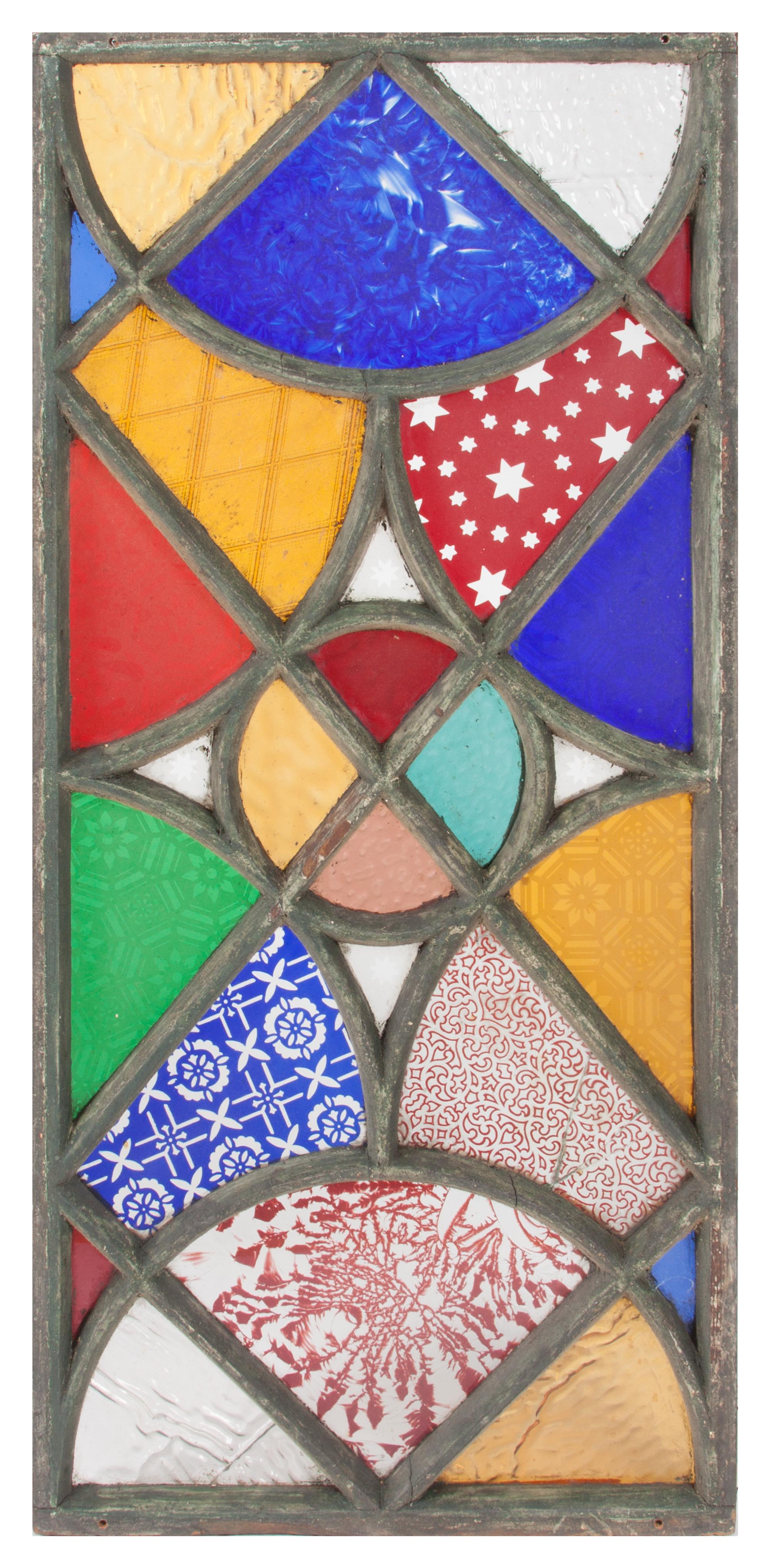 A Victorian Stained Glass Window First: 34 x 15 3/4 inches.