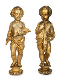 A Pair of Continental Giltwood Figures of Putti