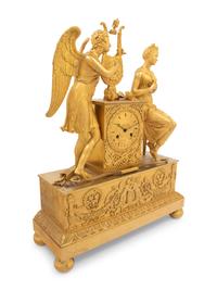 An Empire Gilt Bronze Figural Mantel Clock