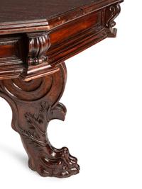 An Italian Baroque Carved Walnut Center Table