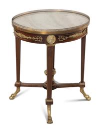 A Louis XVI Style Gilt Bronze Mounted Occasional Table