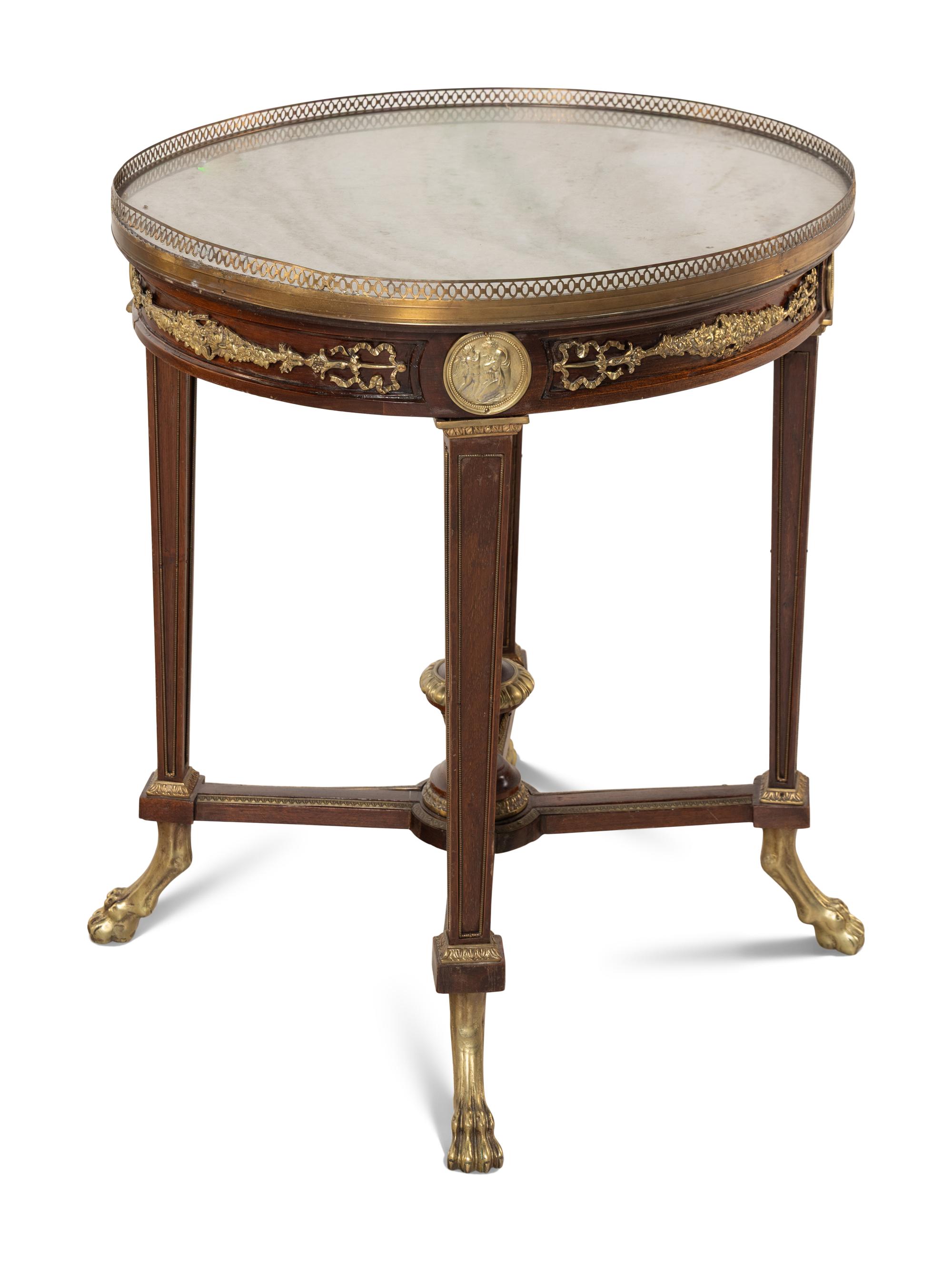 A Louis XVI Style Gilt Bronze Mounted Occasional Table