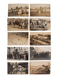 [EARLY PHOTOGRAPHY]. A group of 42 real photo postcards of cityscapes, town activities and disasters, parades, circuses, and fairs, highlighted by view of a child labor protest, an elephant parade, and bronco busting.