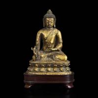 A Sino-Tibetan gilt bronze figure of Bhaishajyaguru 鎏金铜药师佛造像 18th century ????