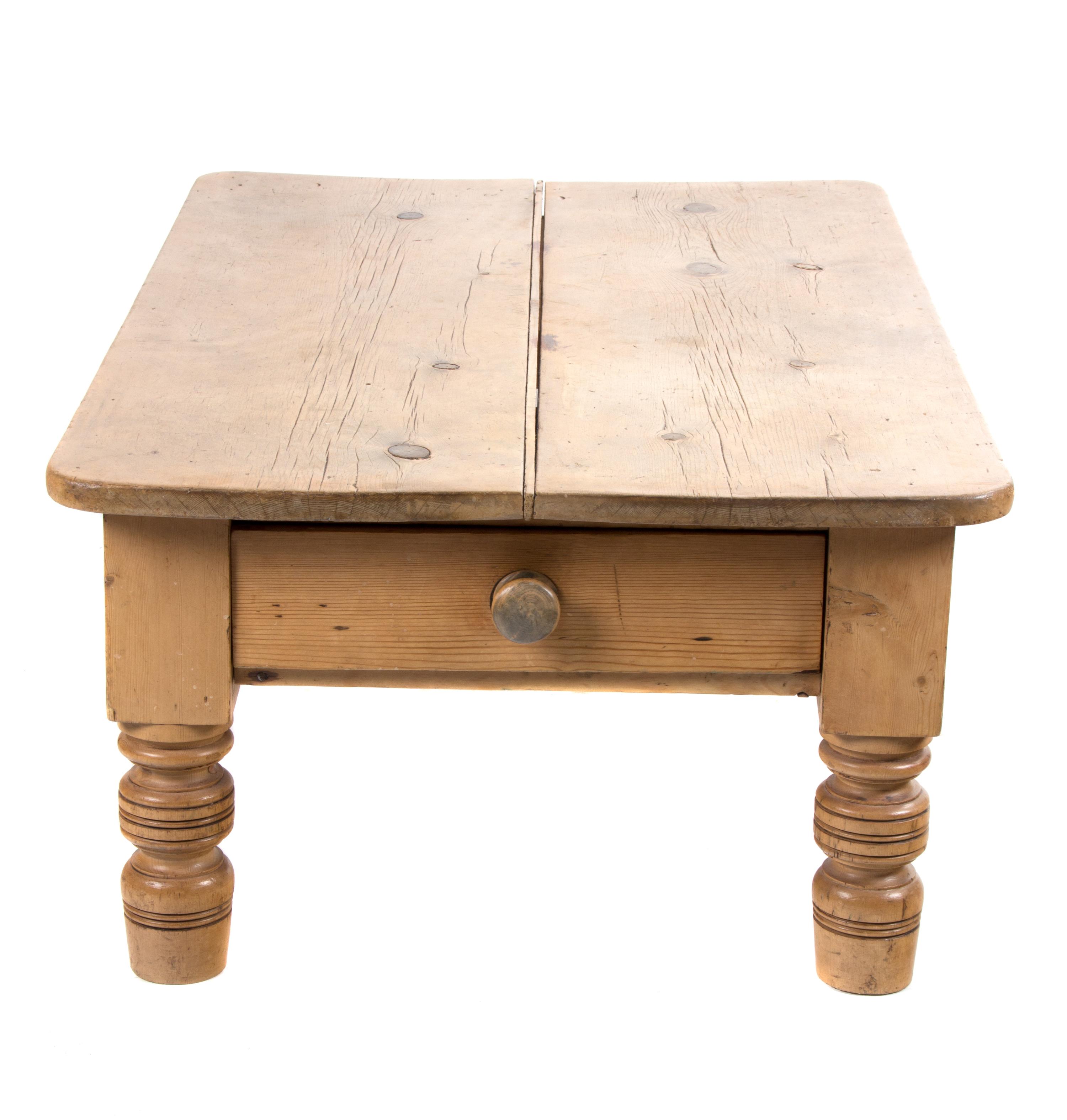 A Provincial Style Pine Low Table Height 18 1/4 x length 47 1/2 x depth 30 1/4 inches. — LATE 20TH CENTURY