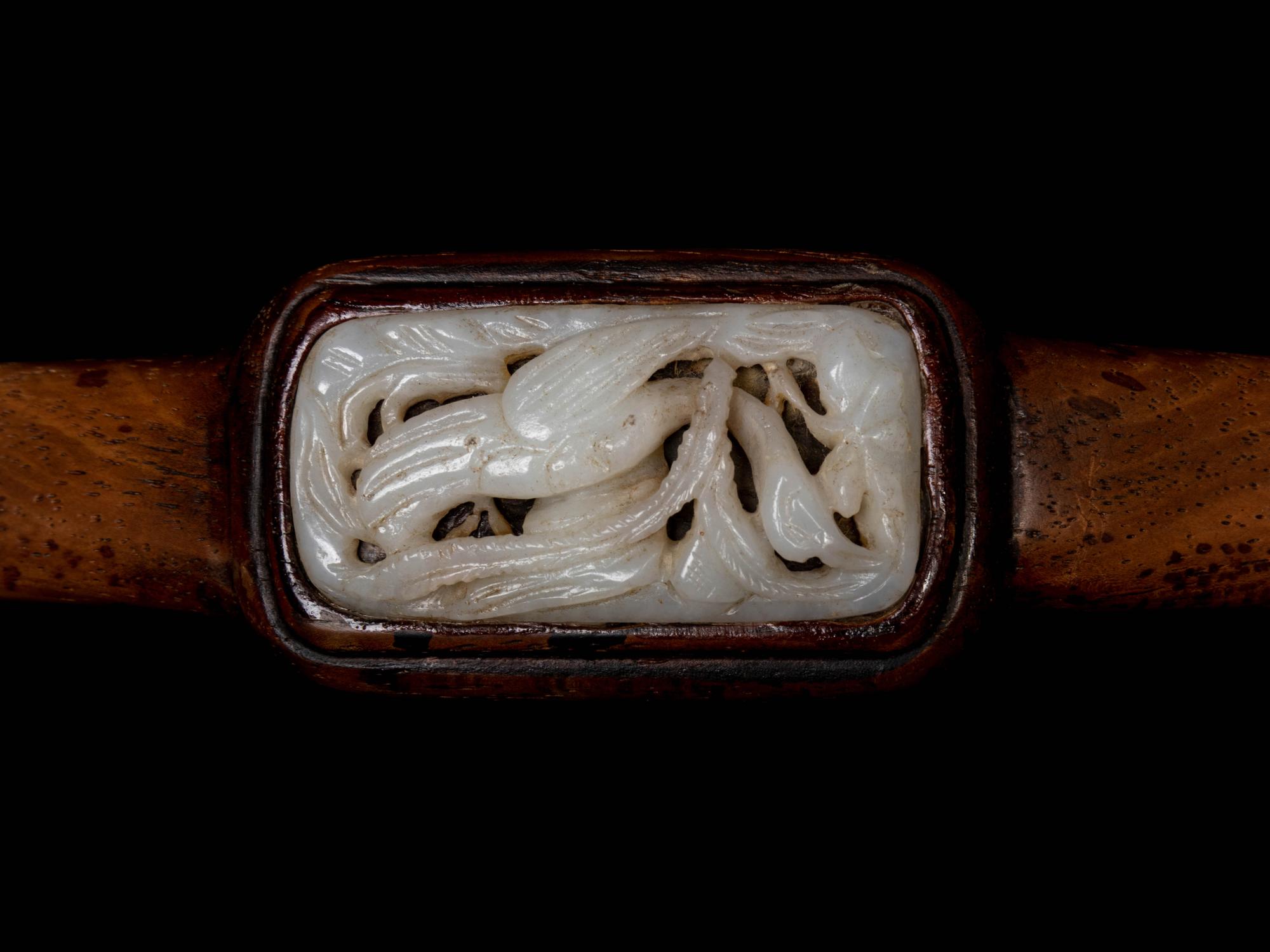 A Chinese White Jade Inset Hardwood Ruyi Scepter