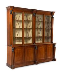 A Regency Part Ebonized Mahogany Breakfront Bookcase