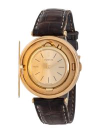 CORUM, 18K YELLOW GOLD HIDDEN DIAL COIN WATCH