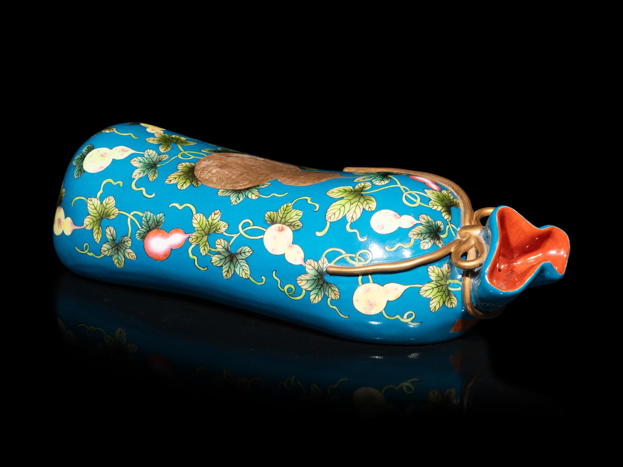 A Chinese Famille Rose Porcelain Bag-Form Pillow