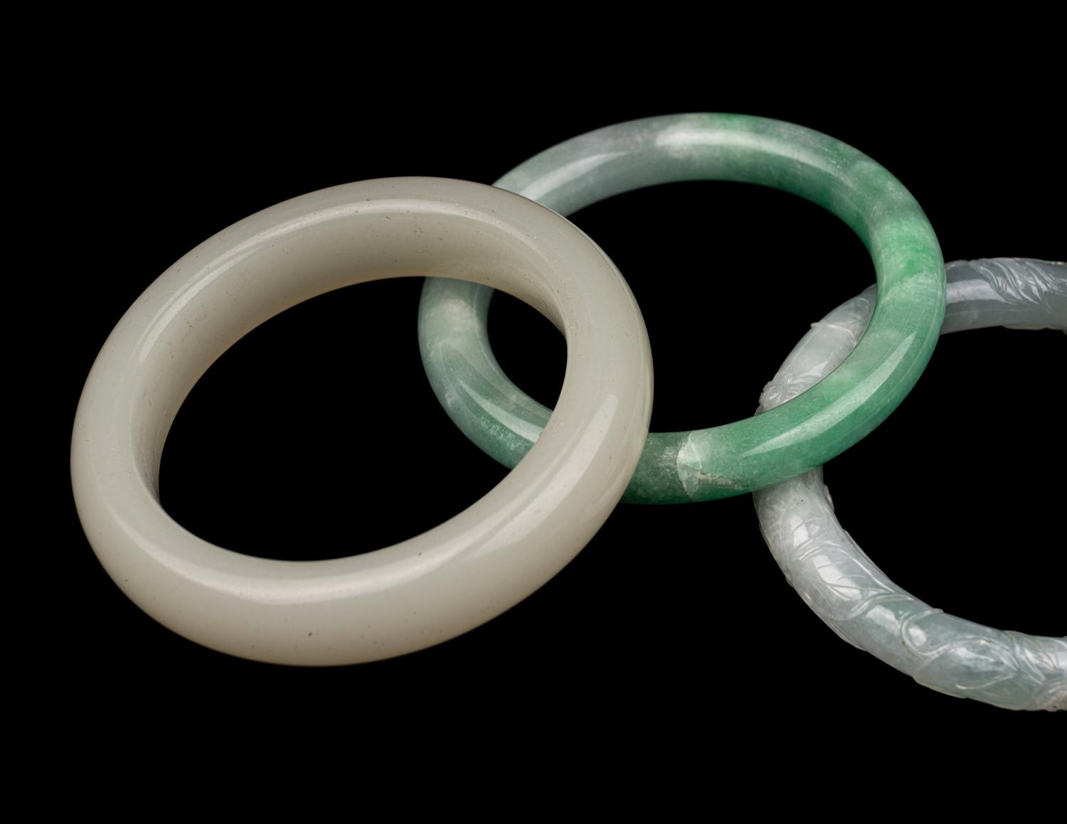 Five Chinese Jadeite and Glass Bracelets