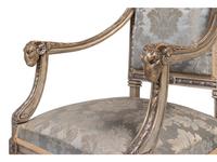 A Pair of Louis XVI Style Carved and Silver Paint Decorated Fauteuils