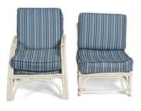 A Group of Five White Rattan Chairs