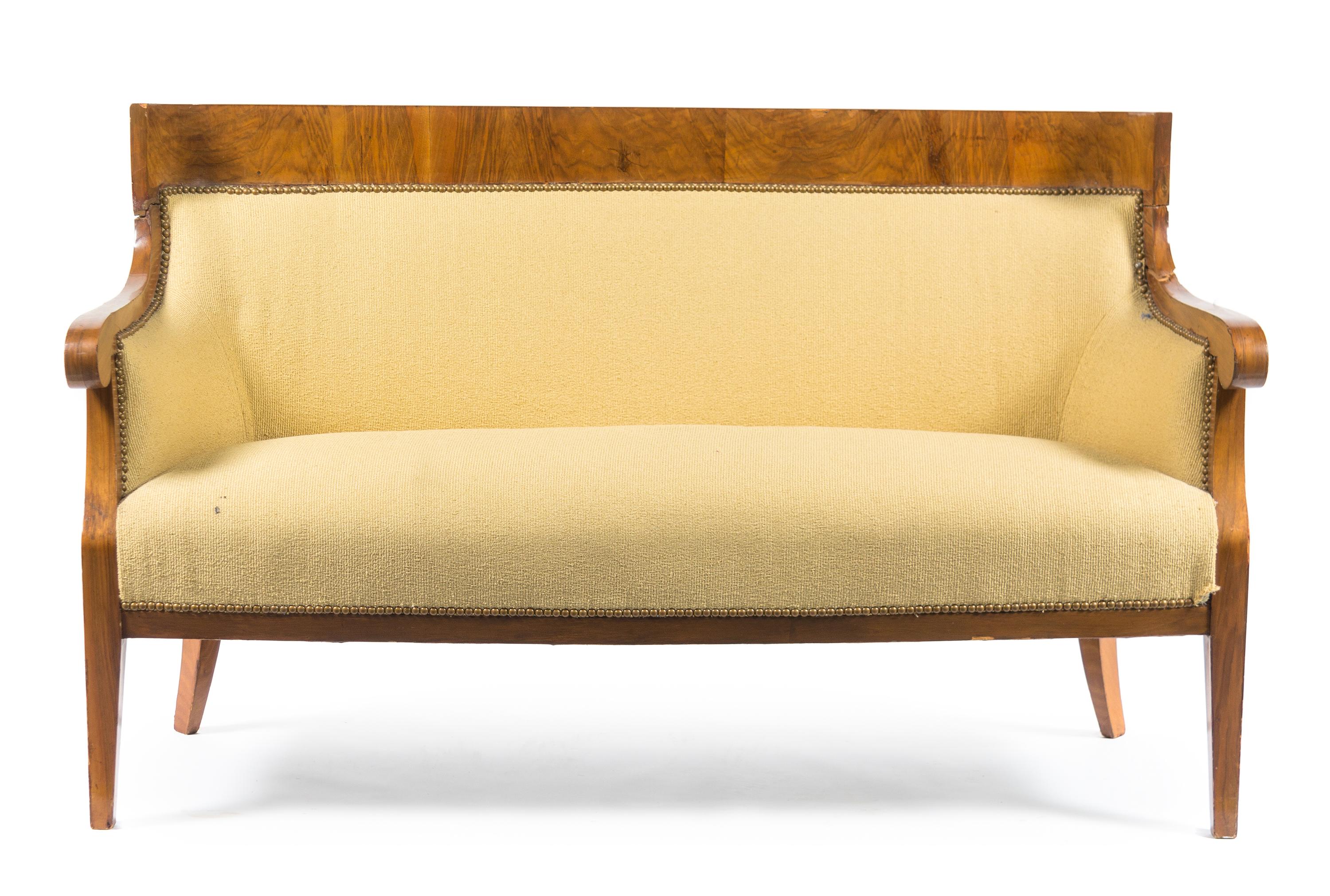 A Biedermeier Burlwood Settee Height 36 x width 56 x depth 22 1/2 inches. — CIRCA 1830