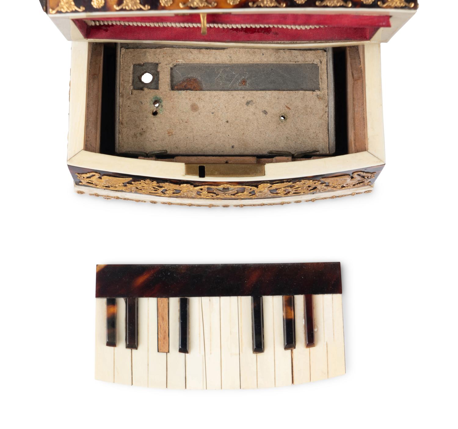 A Palais Royal Gilt Metal Mounted Tortoise Shell Piano Form Nécessaire Case