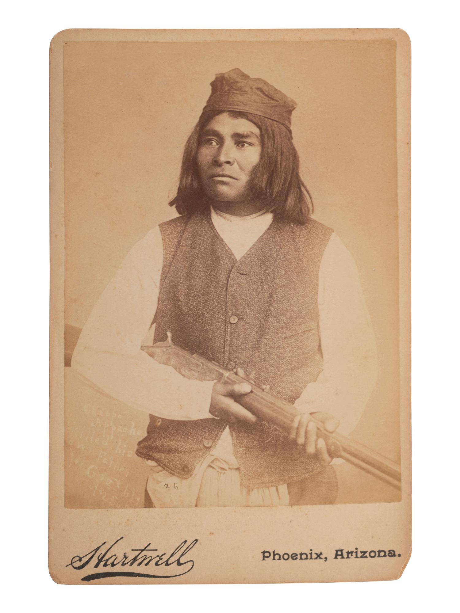 [NATIVE AMERICANS]. HARTWELL, F.A., photographer. Cabinet card of armed Apache subject identified as Chappo. Phoenix, AZ.