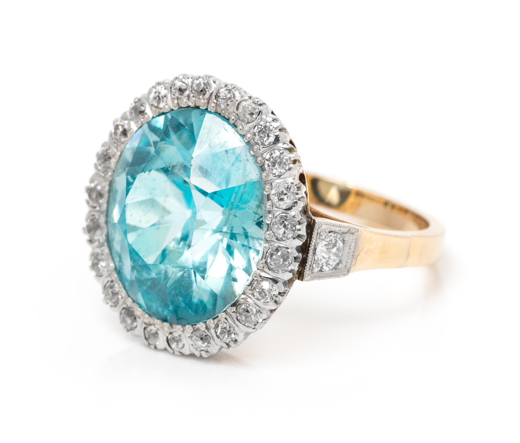 An Edwardian Platinum Topped Gold, Blue Zircon and Diamond Ring, 6.70 dwts.