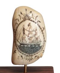 A Pair of Robert Spring Scrimshaw Whale's Teeth