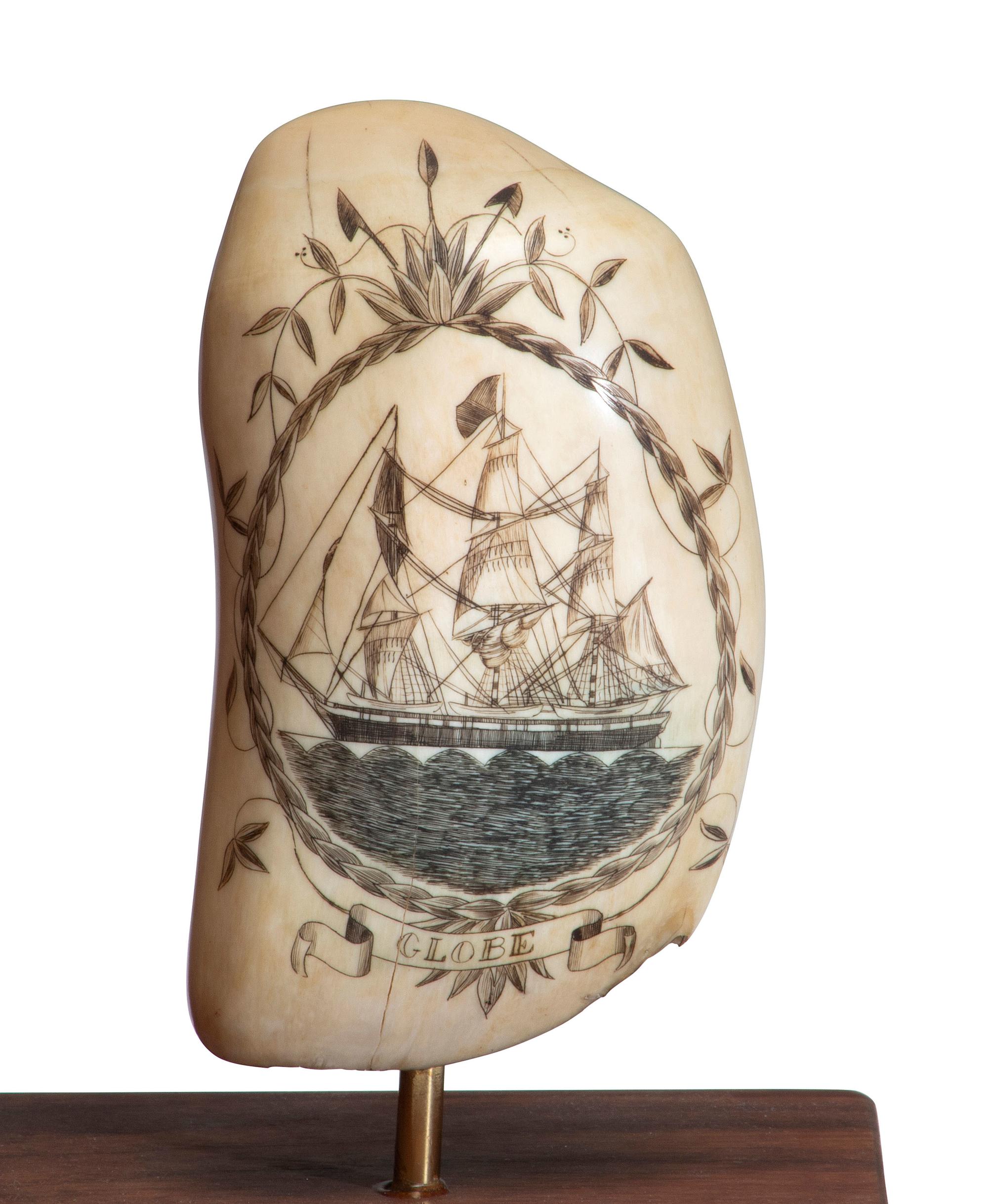 A Pair of Robert Spring Scrimshaw Whale's Teeth