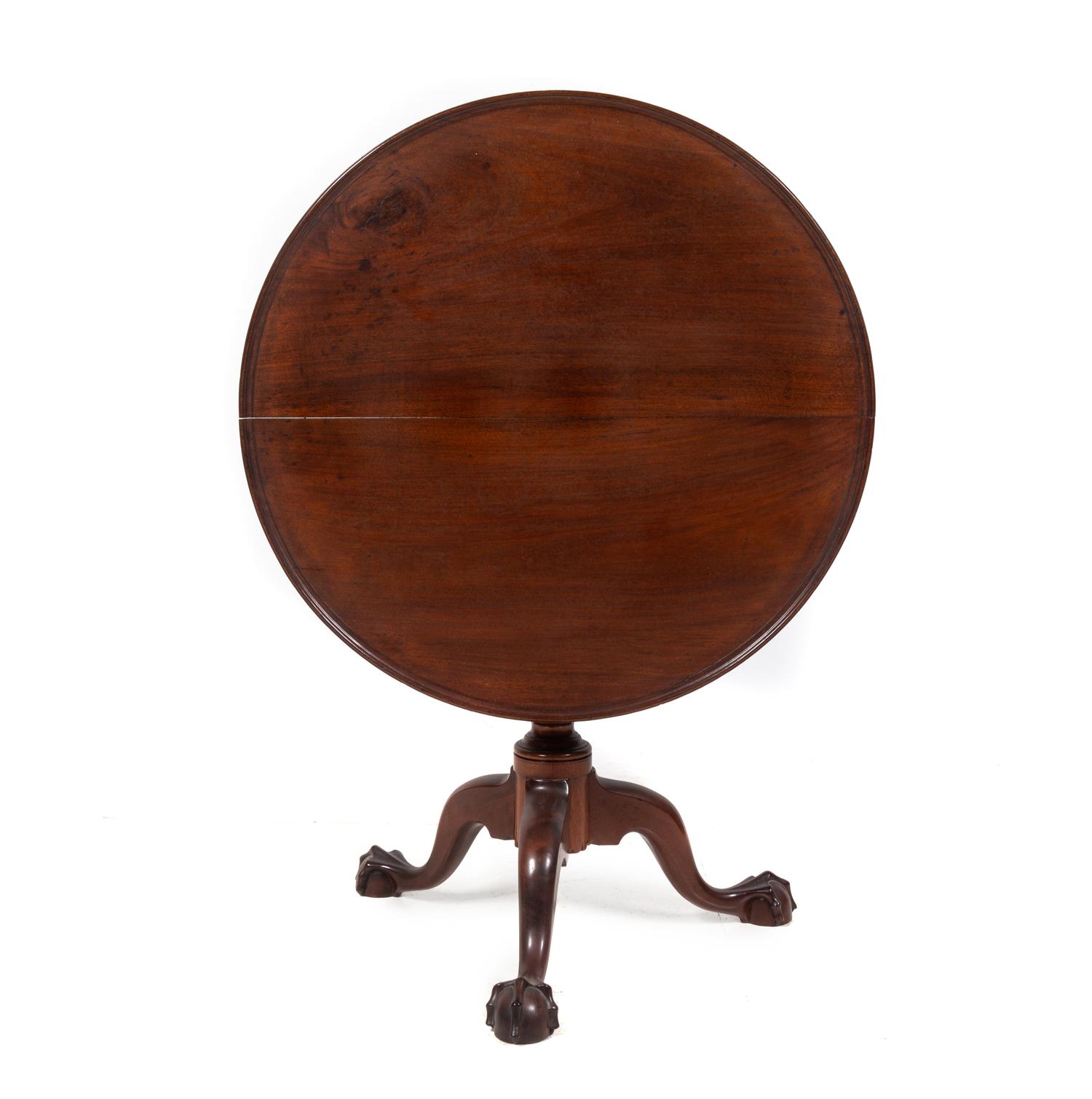 A Chippendale Carved Mahogany Tilt-Top Tea Table