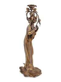 An Art Nouveau Gilt Bronze Figural Candlestick