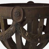 A pair of cast iron open-work garden urns late 19th century