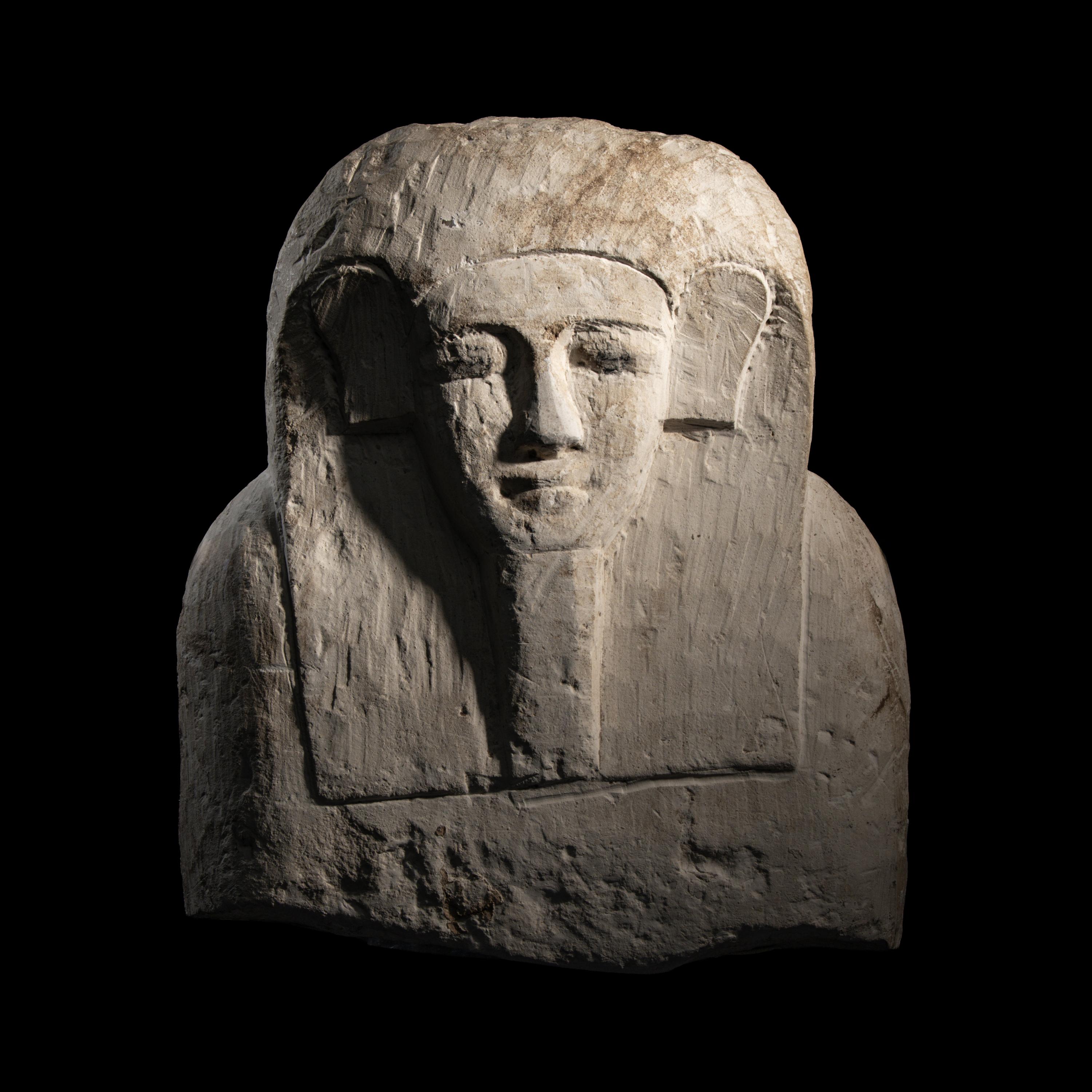 An Egyptian Limestone Sarcophagus Lid