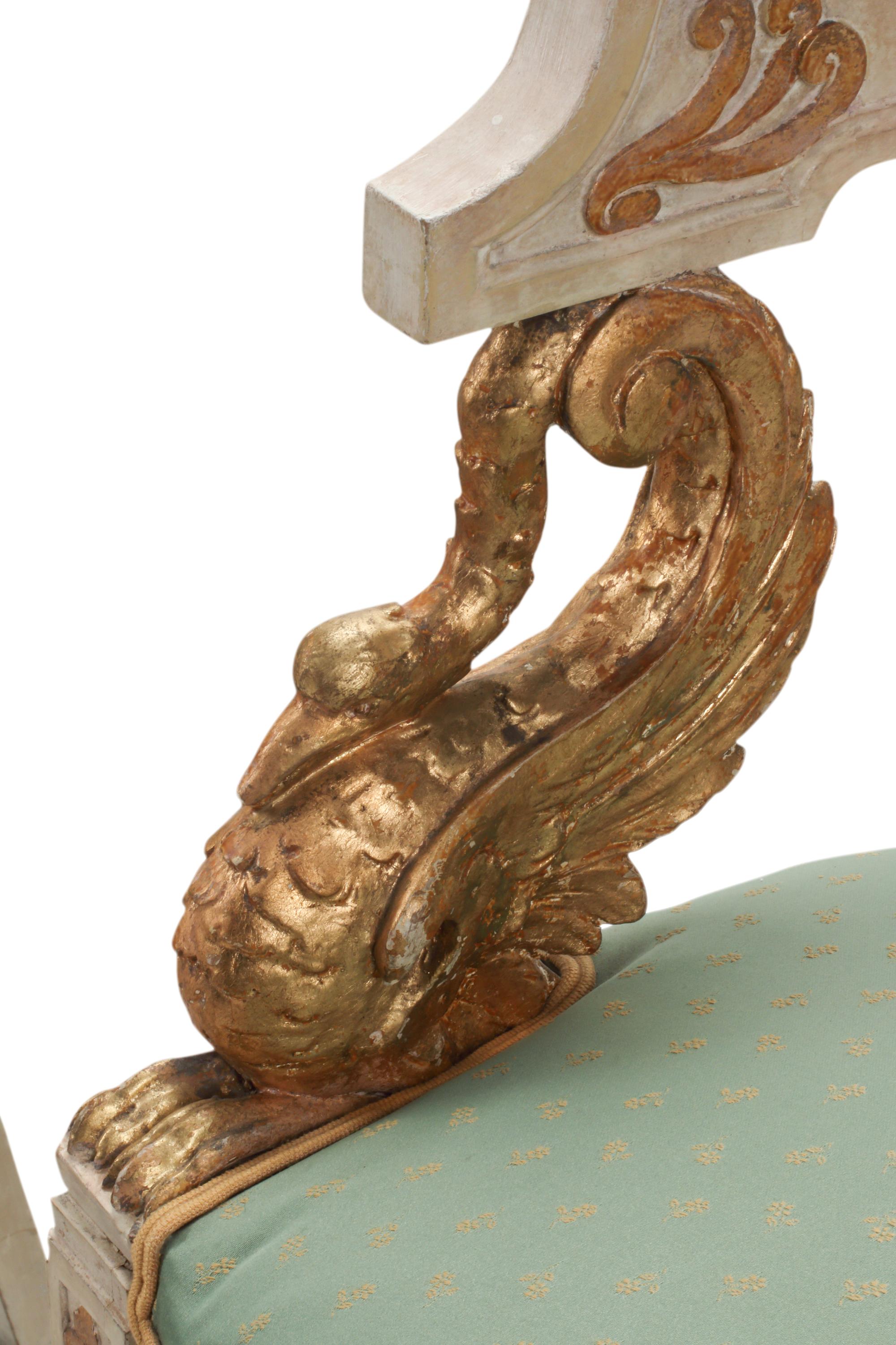 A Pair of Italian Neoclassical Style Painted and Parcel-Gilt Armchairs