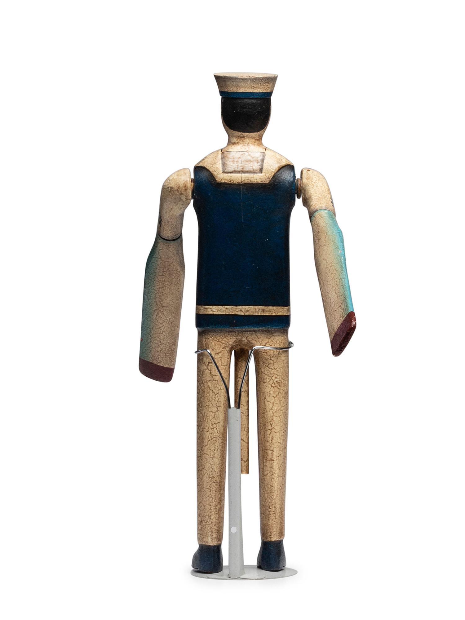 A Carved and Painted Wood Sailor Whirligig