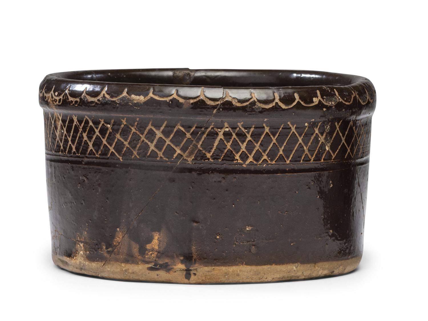 An Incised Albany Slip Presentation Butter Tub