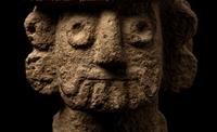 A Tlaloc Stone Figure