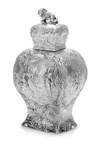 A German Silver Tea Caddy, Wolf & Knell, Hanau, Late 19th/Early 20th Century, of baluster form with a lion finial, the body depicting c