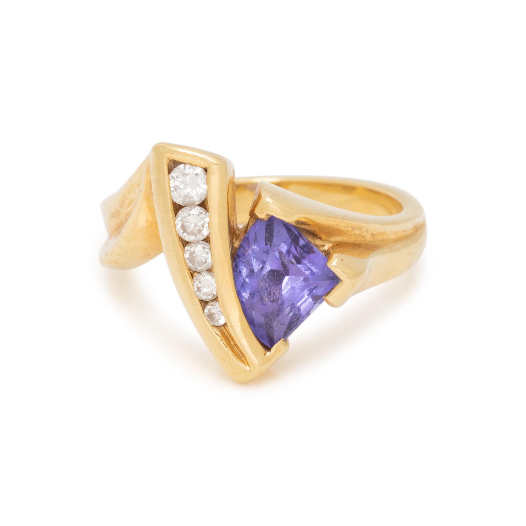 JOHN ATENCIO, TANZANITE AND DIAMOND RING